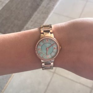 Gold fossil watch